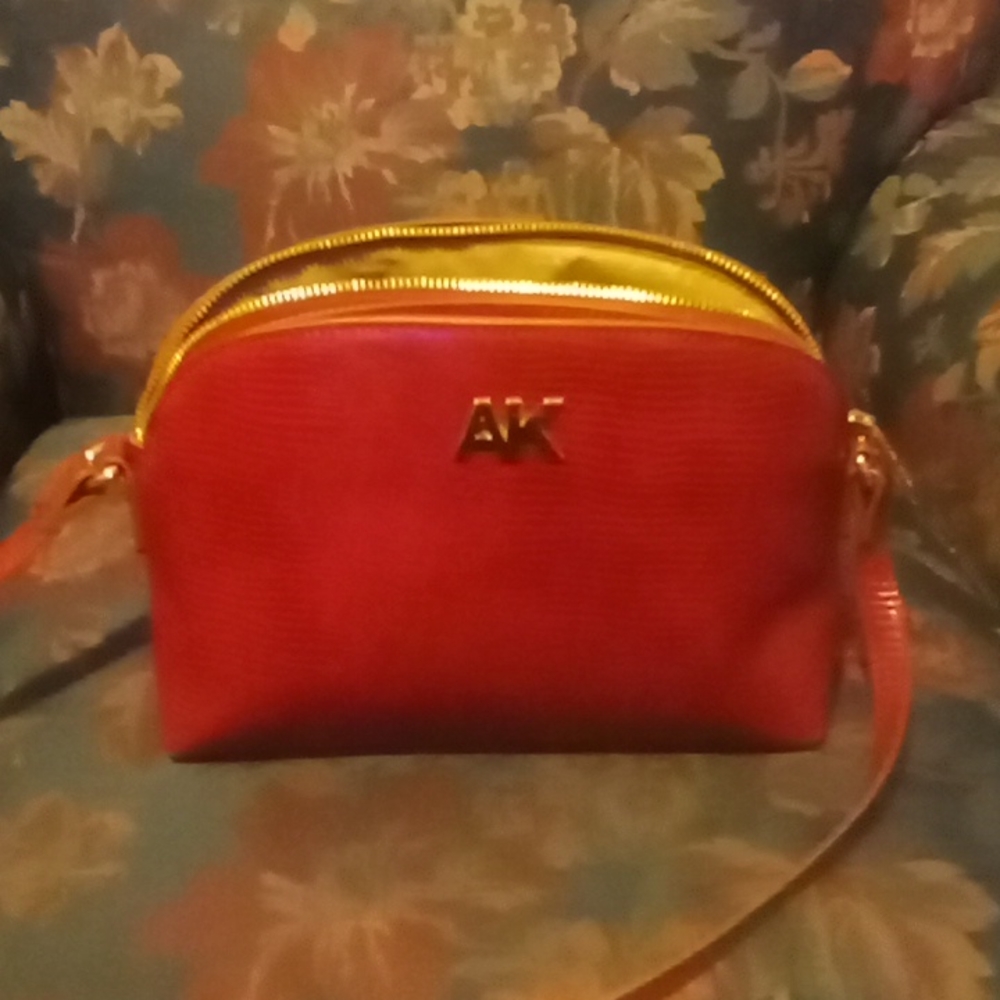 Burgundy/Red Anne Klein Alligator Print Triple Compartment Crossbody Handbag.